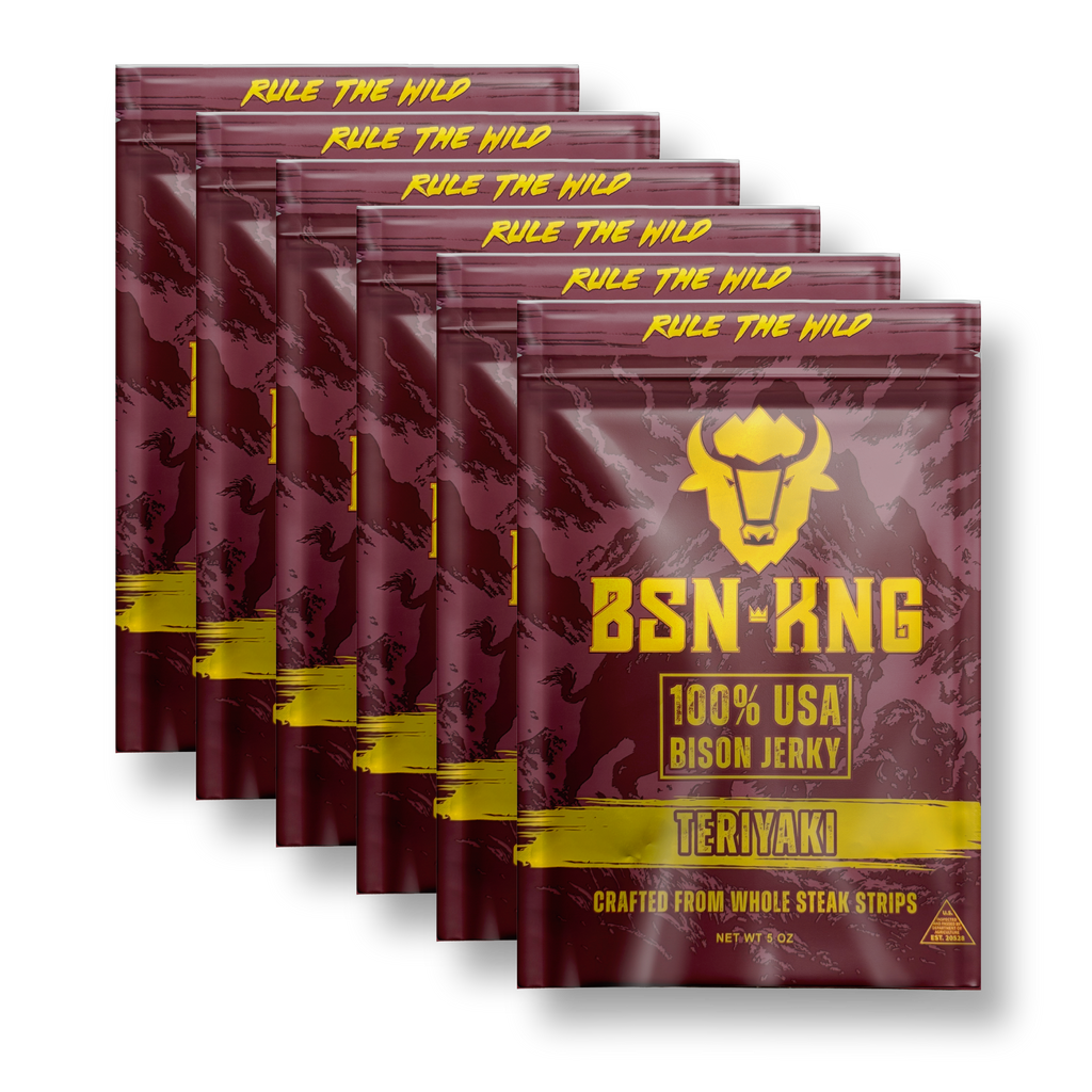 Multiple packages of BSN-KNG 100% USA Bison Jerky in teriyaki flavor on a white background